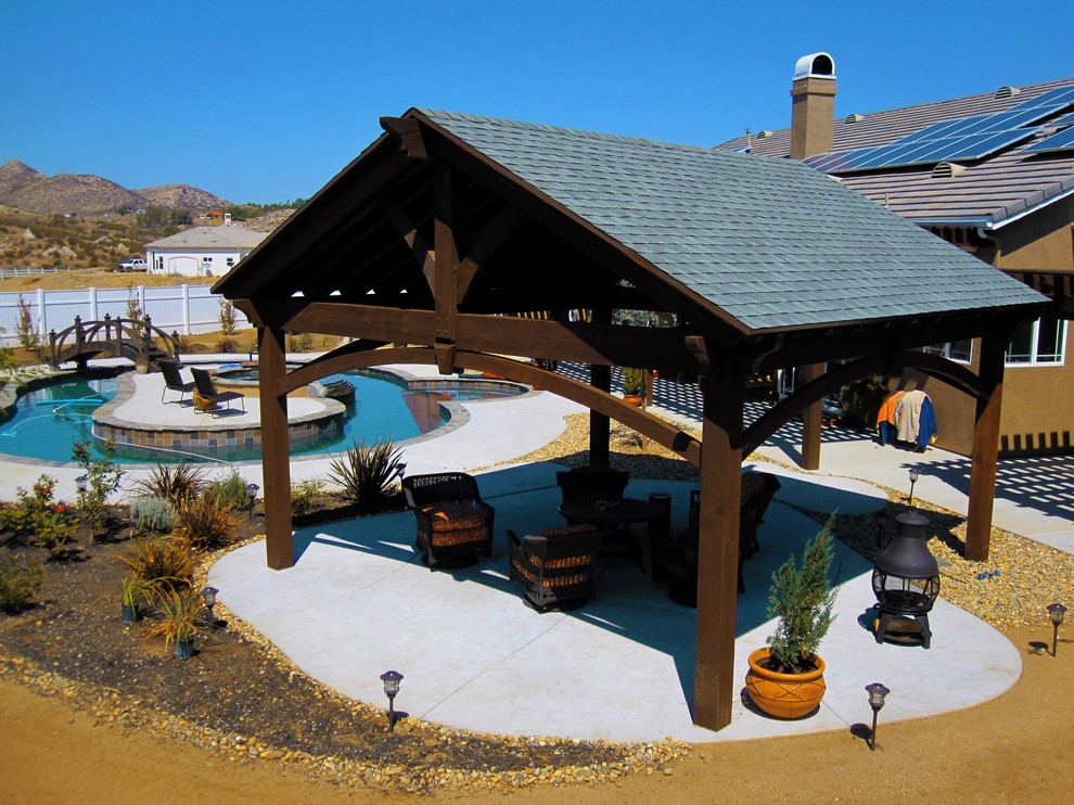 Inspiration for a large back patio in Salt Lake City with a gazebo and concrete slabs.