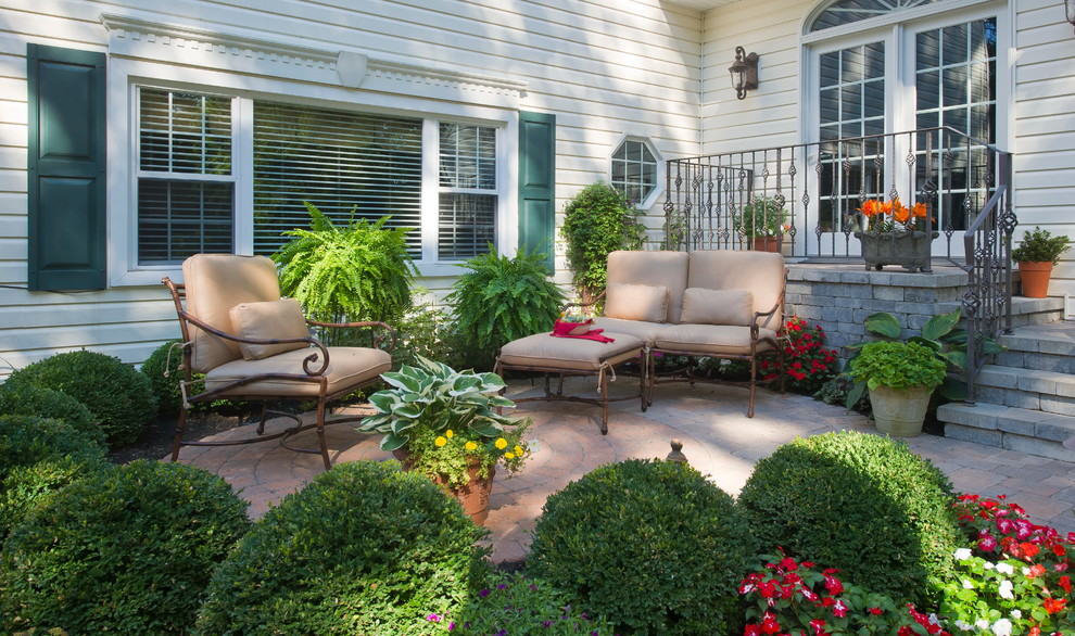 Elegant patio photo in Other