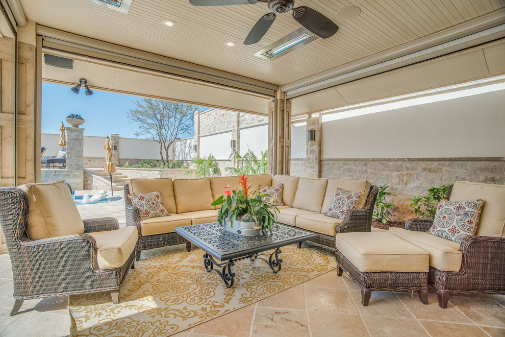 Inspiration for a medium sized classic back patio in Austin with tiled flooring and a roof extension.