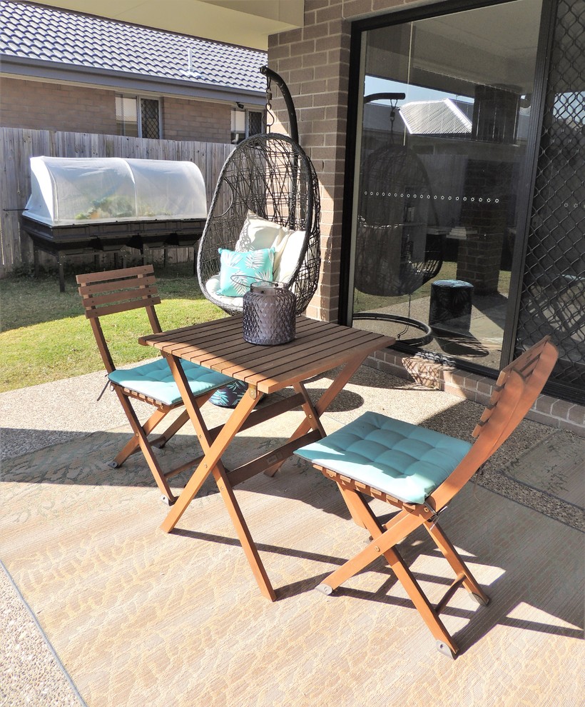 This is an example of a world-inspired patio in Gold Coast - Tweed.