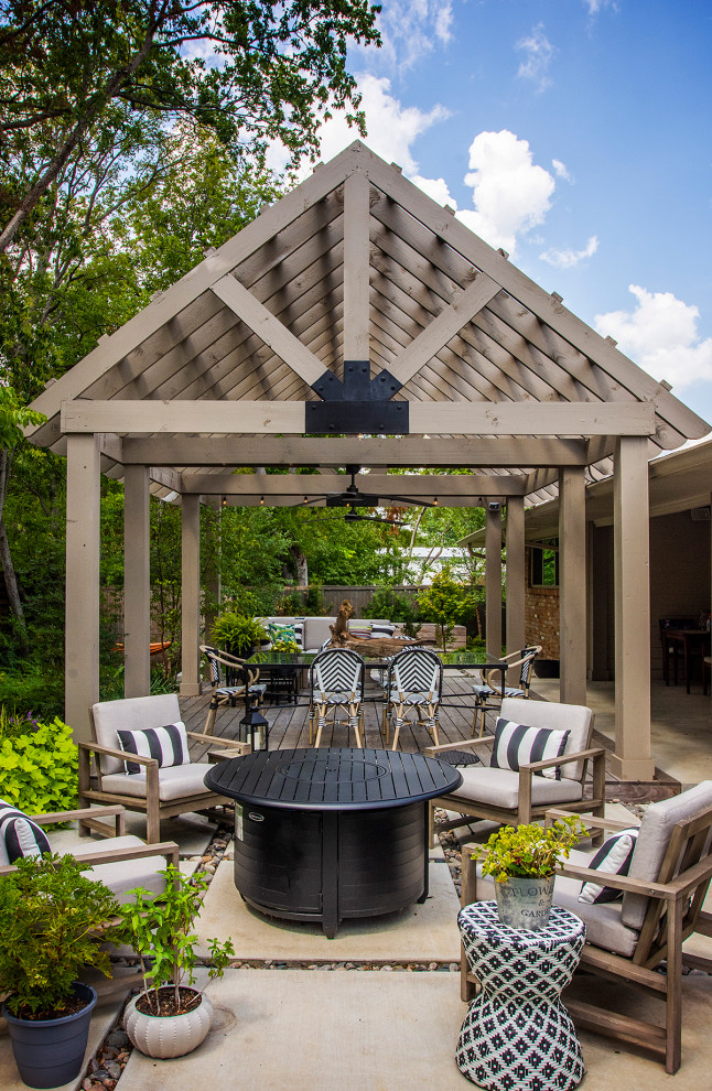 Design ideas for a classic back patio in Dallas with concrete paving.
