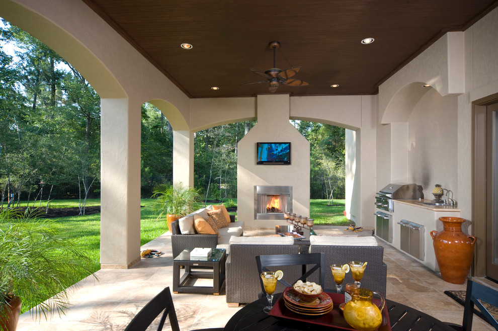 Inspiration for a contemporary patio in Houston with an outdoor kitchen.
