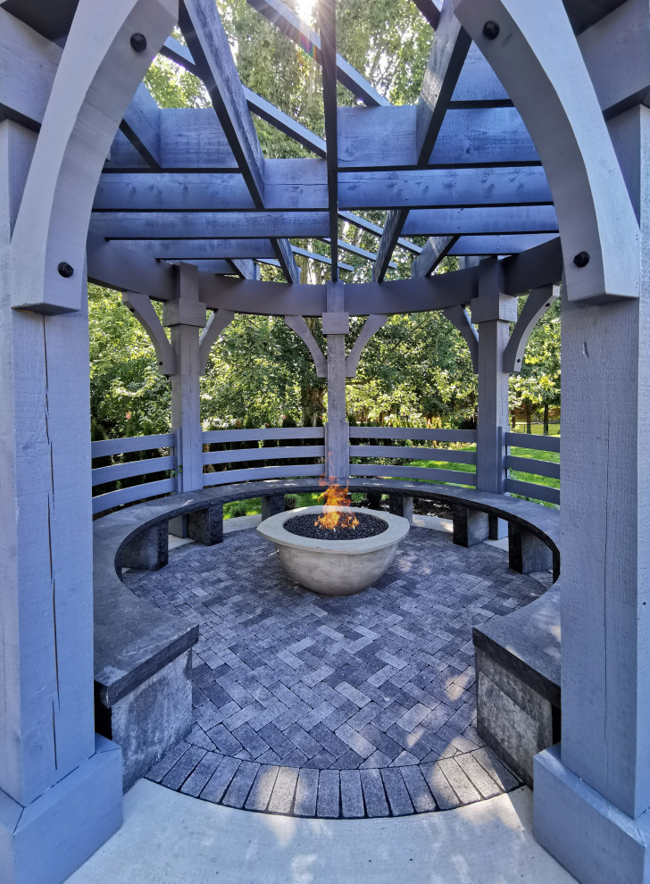 Contemporary patio with a fire feature.