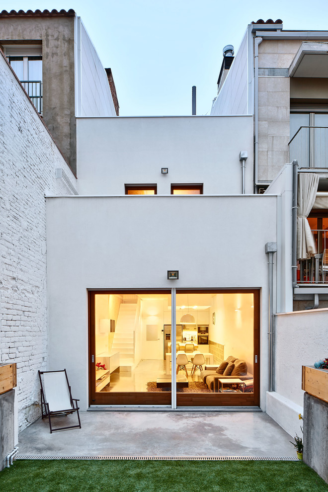 Ispirazione per un patio o portico design di medie dimensioni e dietro casa con nessuna copertura