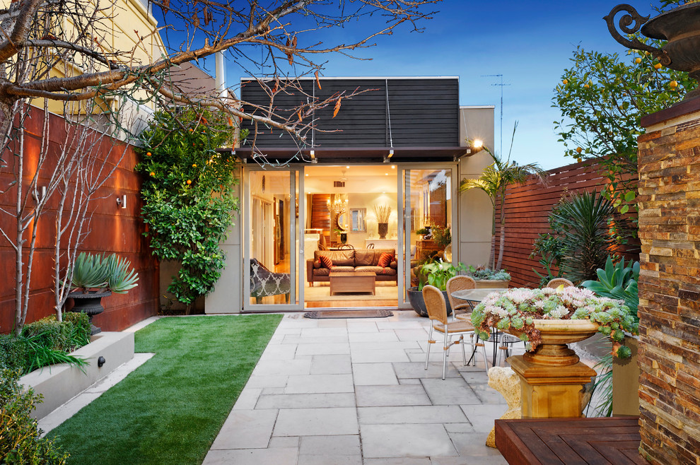 Photo of a contemporary patio in Melbourne with no cover.
