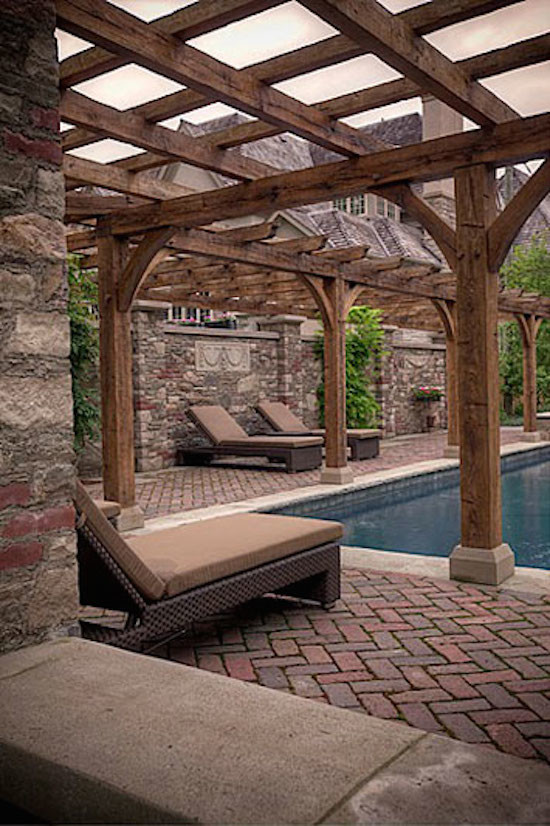 Large elegant backyard brick patio fountain photo in Toronto