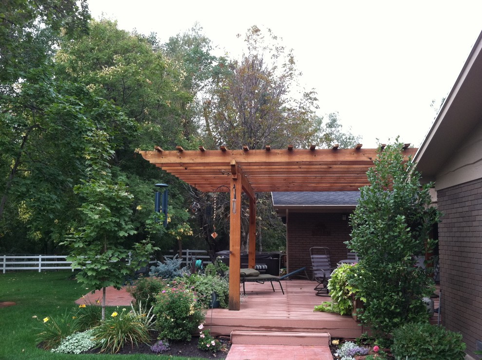 Adams Trex deck with Rough Sawn Cedar Sunshade Traditional Patio