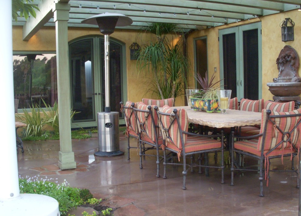 Adding Pergola and Fountain Help Define Patio Mediterranean Patio