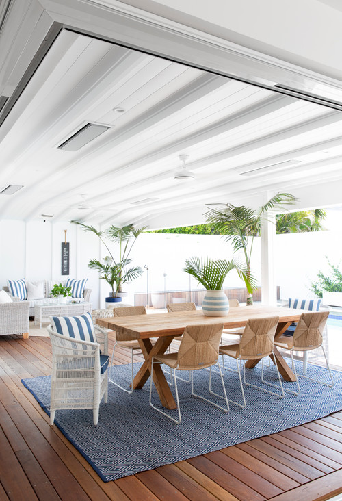 outdoor living area in blue and white with skylights