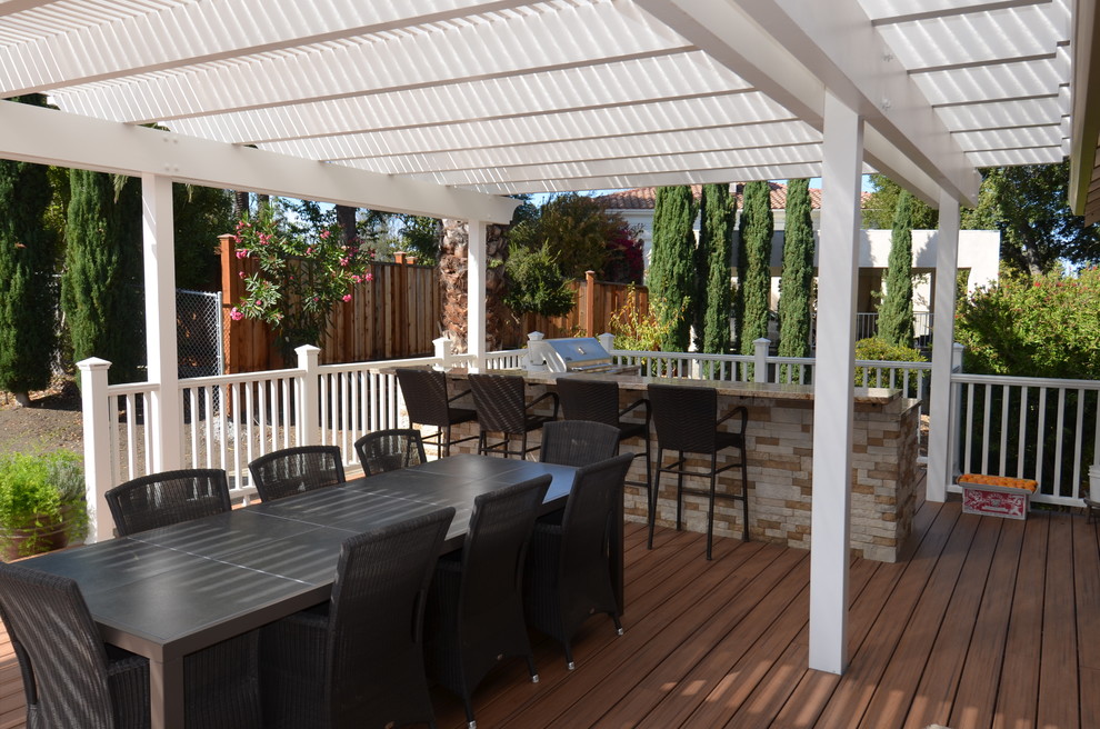 Inspiration for a mid-sized timeless backyard patio remodel in San Francisco with decking and a pergola
