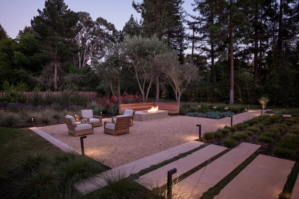 Large minimalist backyard gravel patio photo in San Francisco with a fire pit and no cover