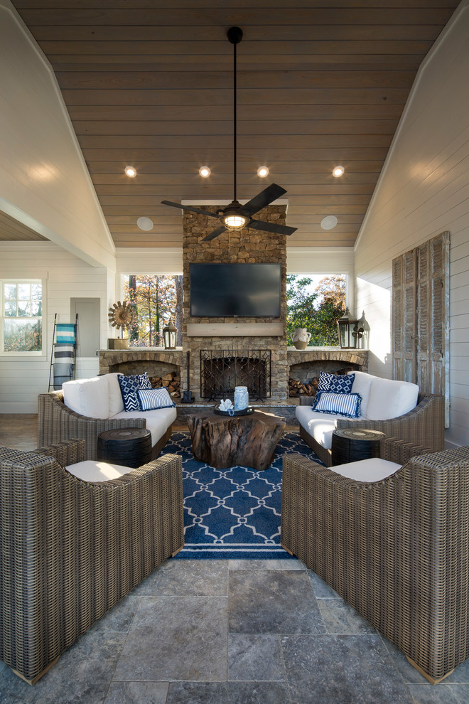 Inspiration for a coastal patio remodel in Other with a fire pit and a gazebo