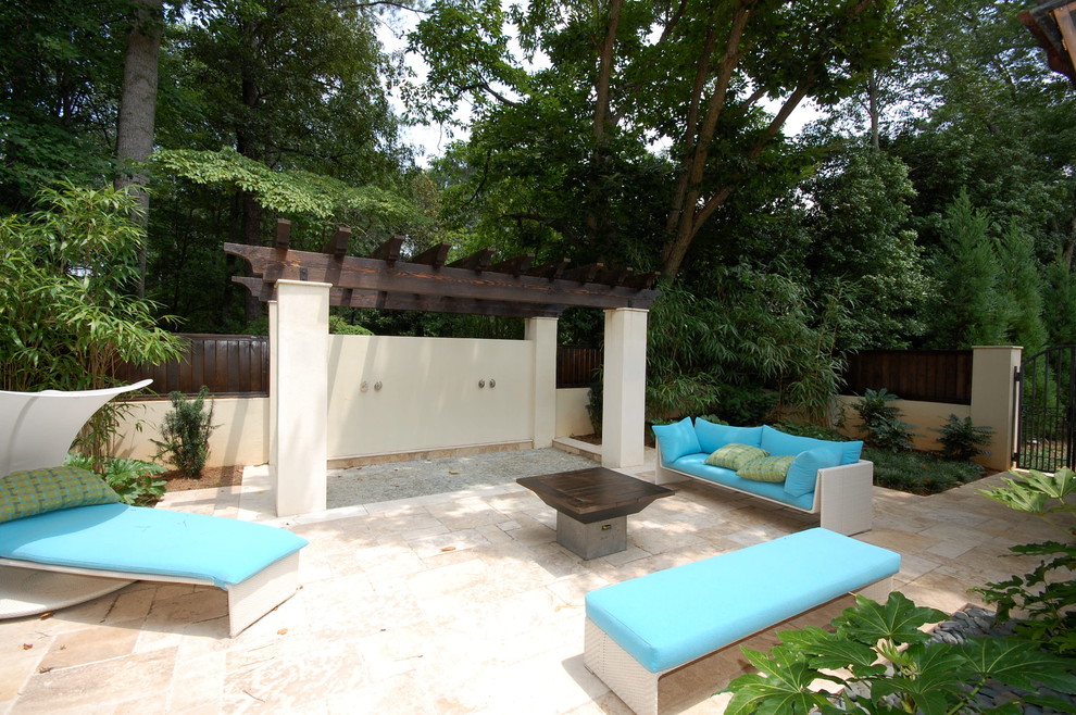 This is an example of a mediterranean patio in Atlanta with no cover.