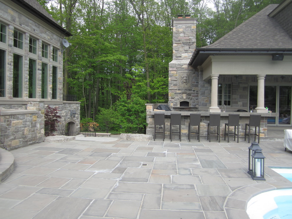 Inspiration for a rustic patio remodel in Toronto