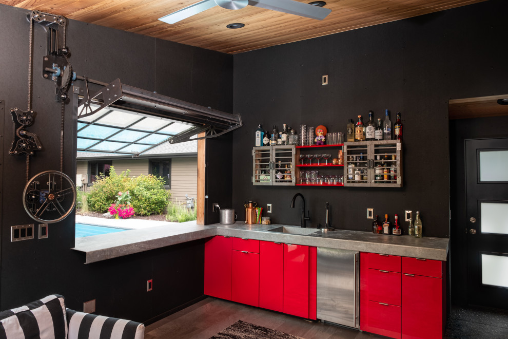Inspiration pour une terrasse arrière design de taille moyenne avec une cuisine d'été.