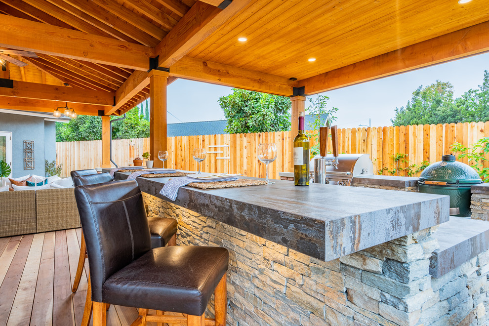 Backyard Oasis with Outdoor Kitchen and Entertaining Area Rustic