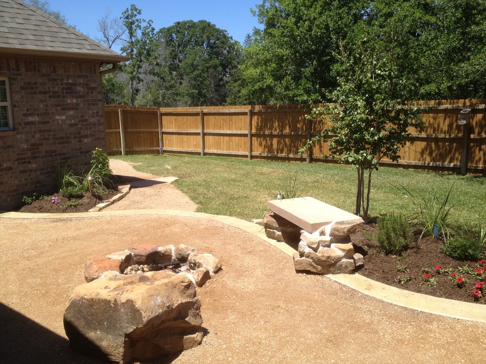 Design ideas for a rustic patio in Austin with a fire feature and decomposed granite.