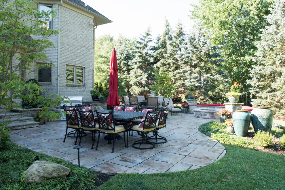 Backyard Patio with Fire Pit, Seating, Grill and Landscaping with Water Feature Patio