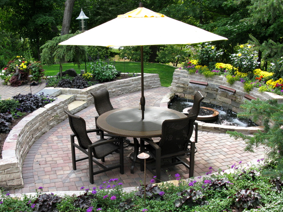 Design ideas for a classic patio in Minneapolis with a fire feature.