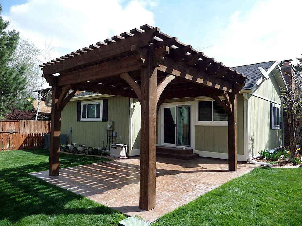 Inspiration for a timeless patio remodel in Salt Lake City with a pergola