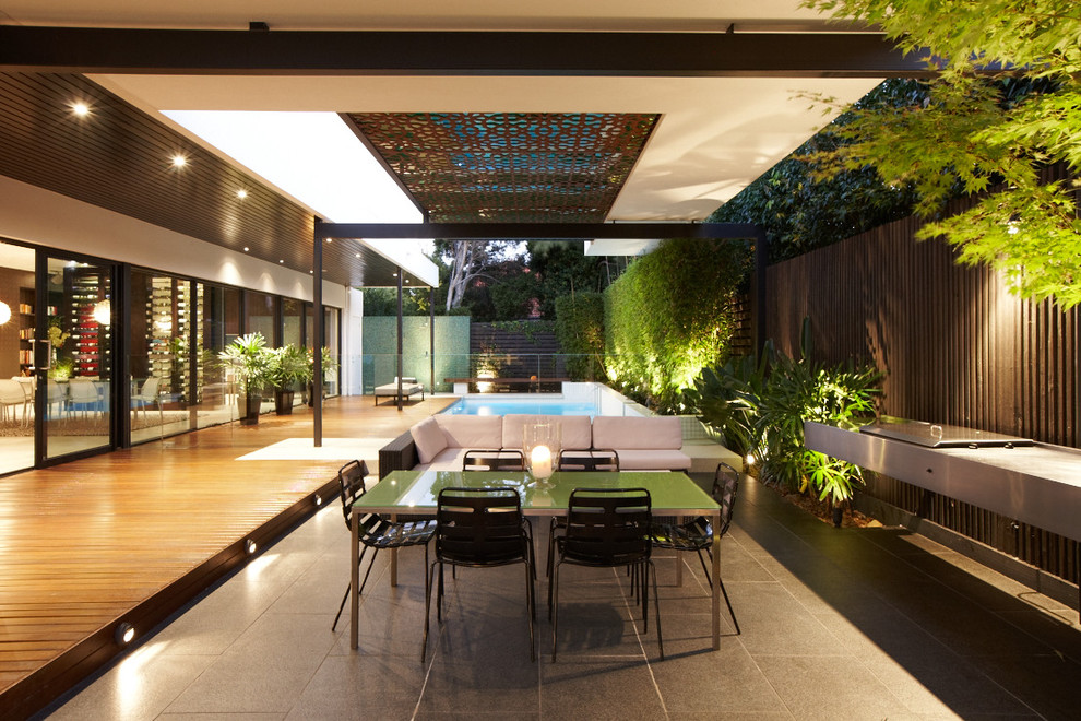 Idée de décoration pour une terrasse en bois design.