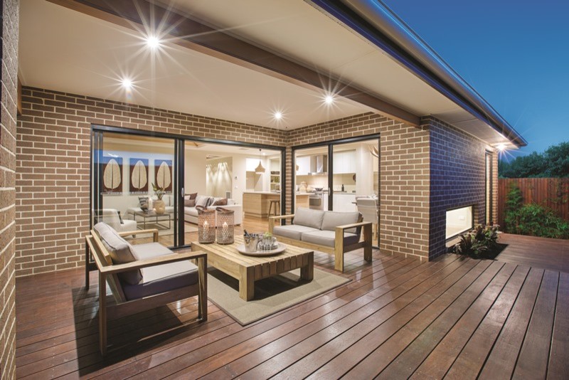 Example of an island style patio design in Melbourne