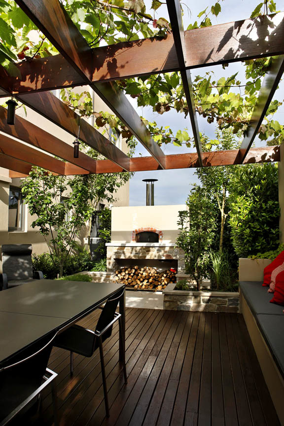 Patio - small contemporary backyard patio idea in Melbourne with decking