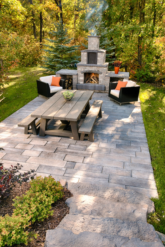 Design ideas for a large classic back patio in Other with an outdoor kitchen, concrete paving and no cover.