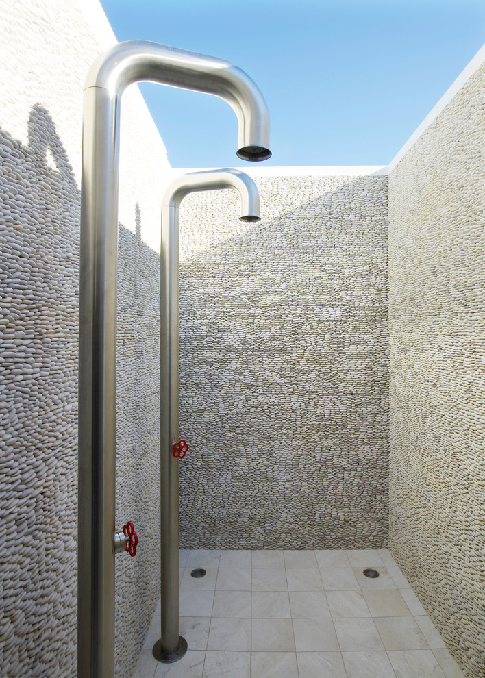 Example of a beach style outdoor patio shower design in New York