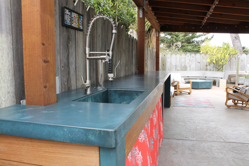 Inspiration for a large coastal backyard concrete patio kitchen remodel with a gazebo