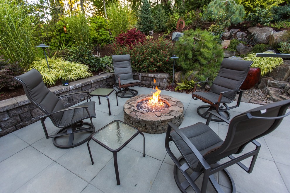 Patio - traditional patio idea in Portland with a fire pit and no cover