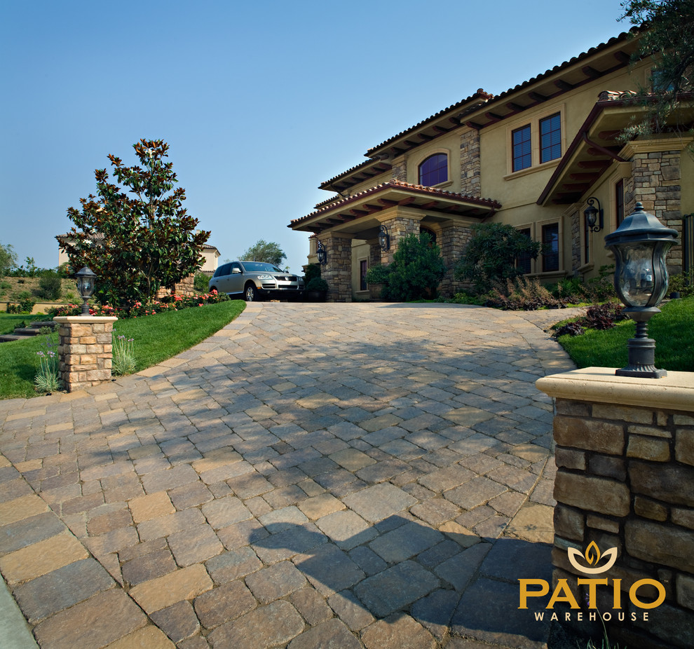 Photo of a rustic back patio in Orange County with concrete paving.