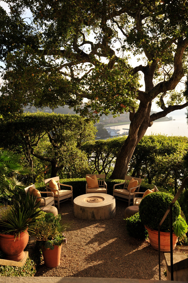 Example of a trendy patio design in San Francisco with a fire pit