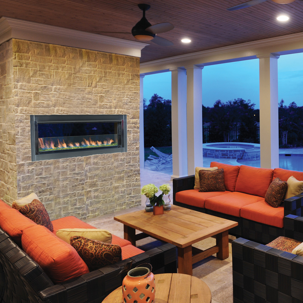Contemporary patio in Orange County with a fire feature.
