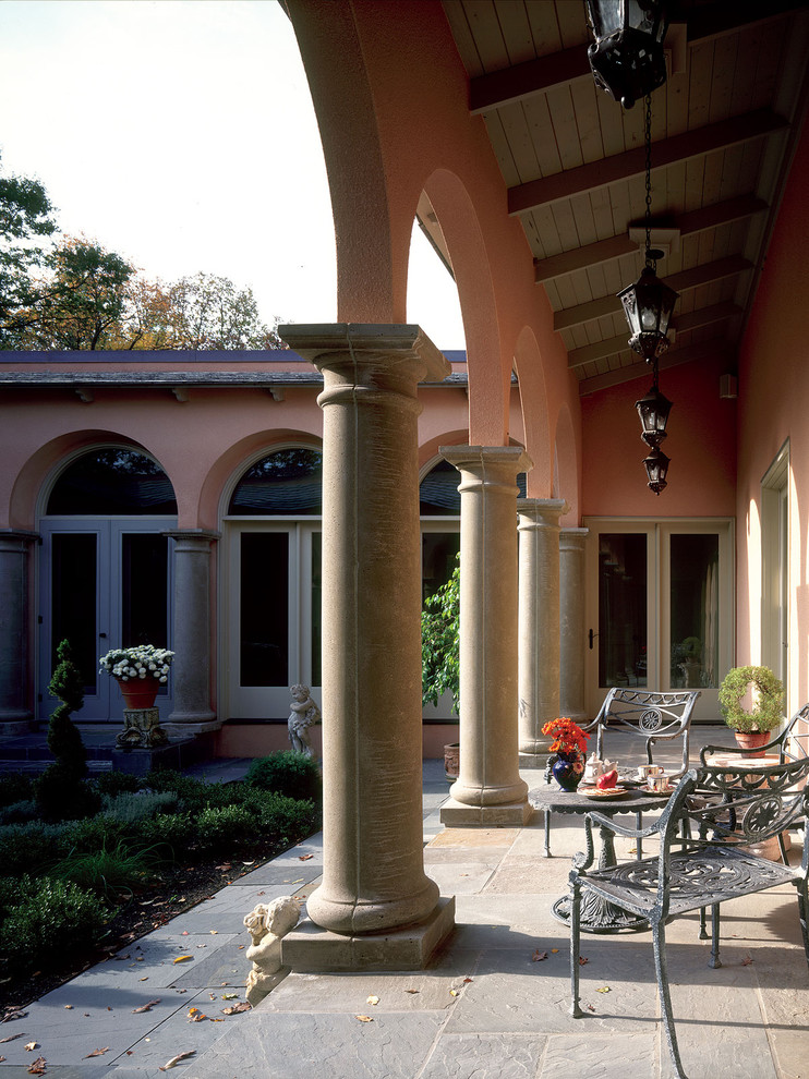 Inspiration for a mediterranean patio remodel in Minneapolis