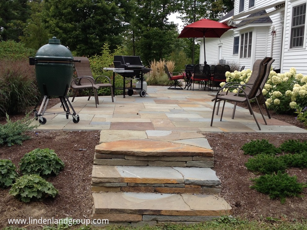 Bluestone dining and living patio Traditional Patio Burlington