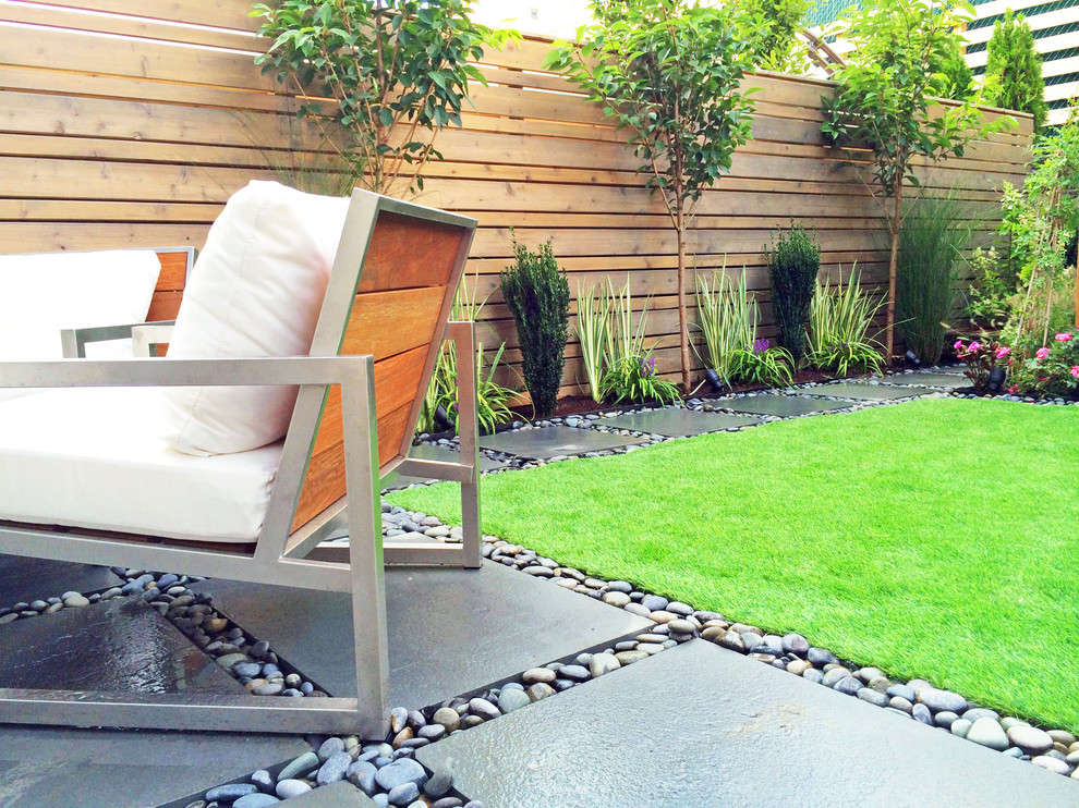 Patio - contemporary backyard patio idea in New York with no cover