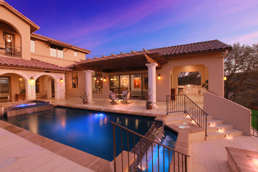 Example of a tuscan patio design in Houston