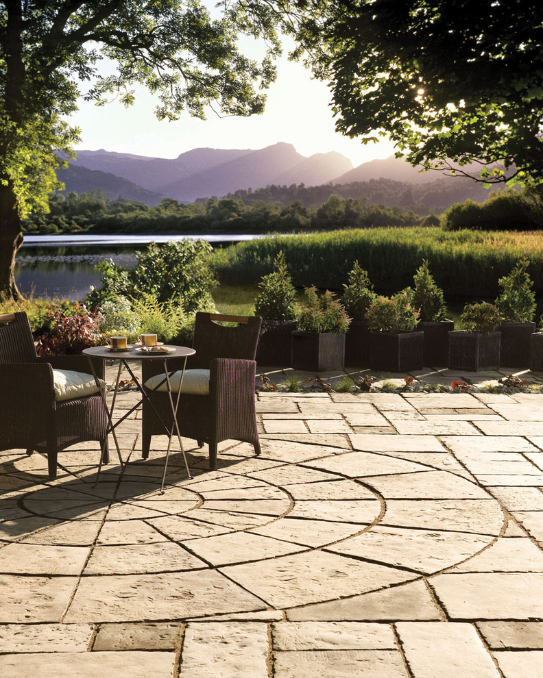 Inspiration for a mediterranean patio remodel in New York with no cover
