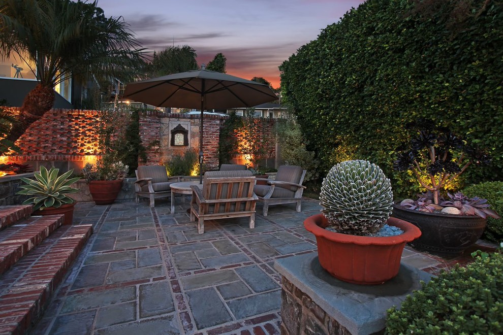 Inspiration for an eclectic patio remodel in Orange County