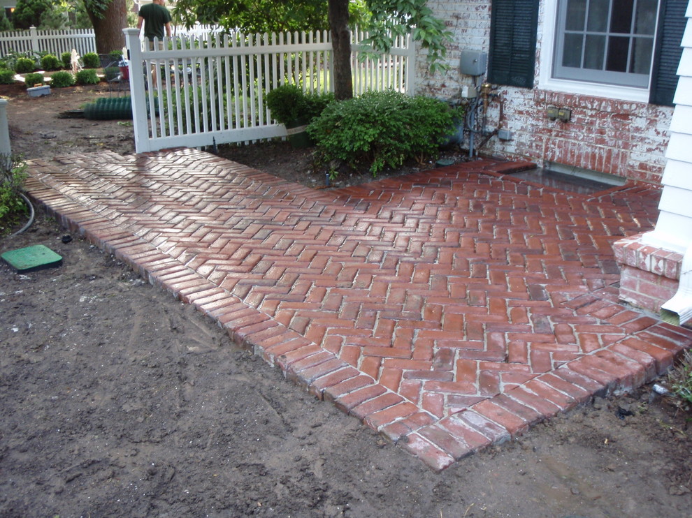 Brick Patio with Masonry Inlay Lincoln, NE. Traditional Patio