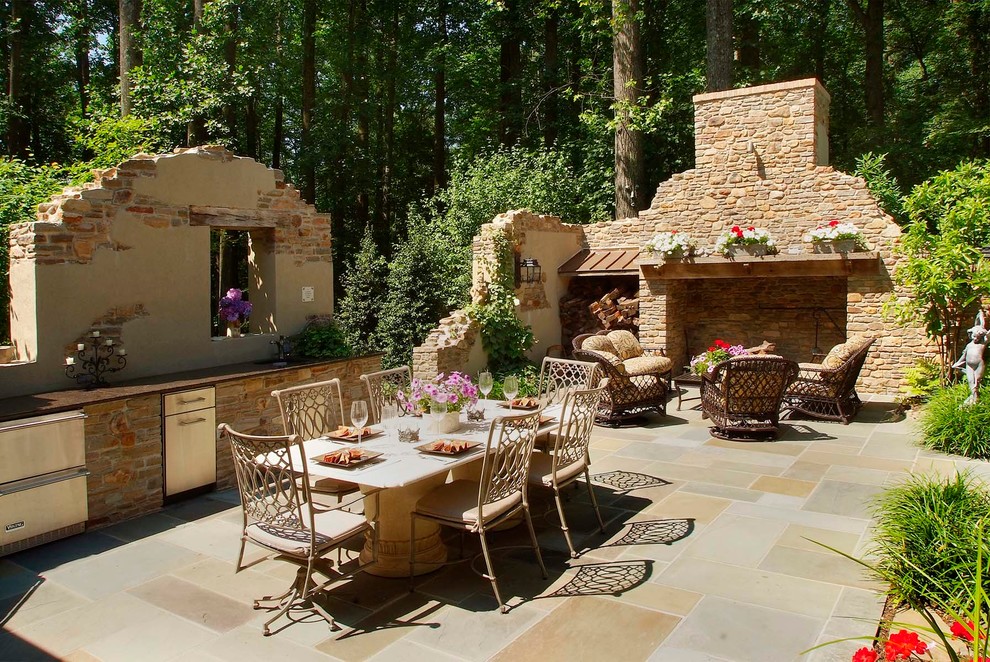 This is an example of a rustic patio in Philadelphia with a fire feature and no cover.