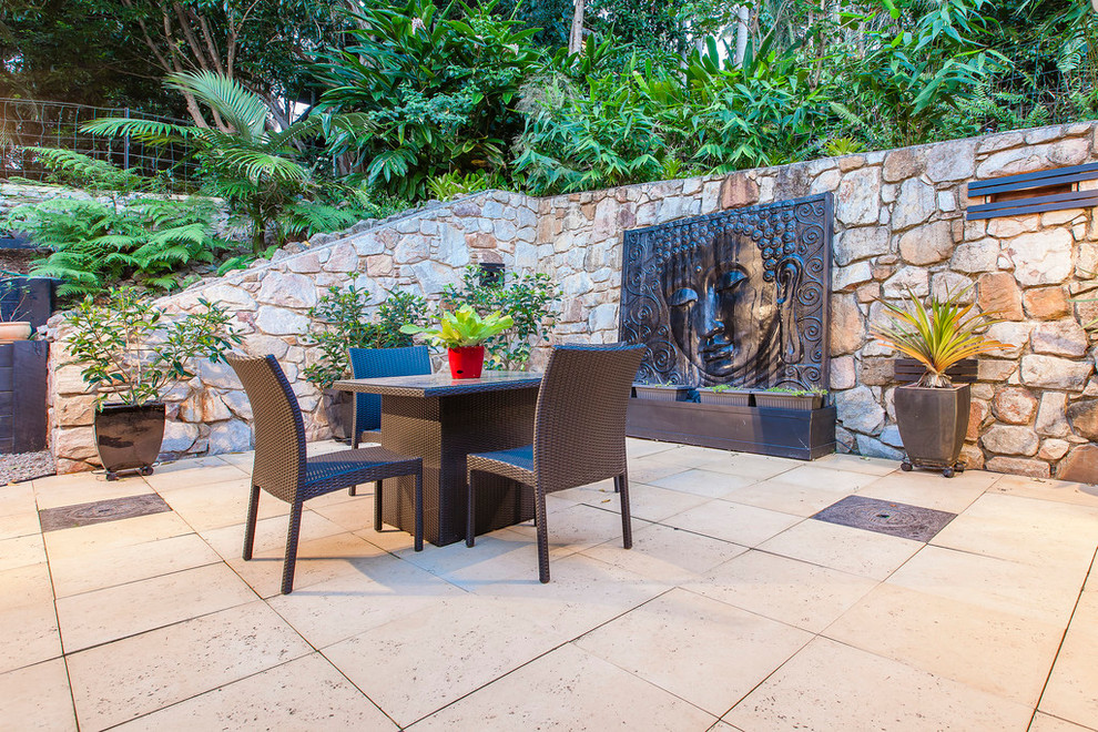 Design ideas for a world-inspired patio in Sunshine Coast with no cover.