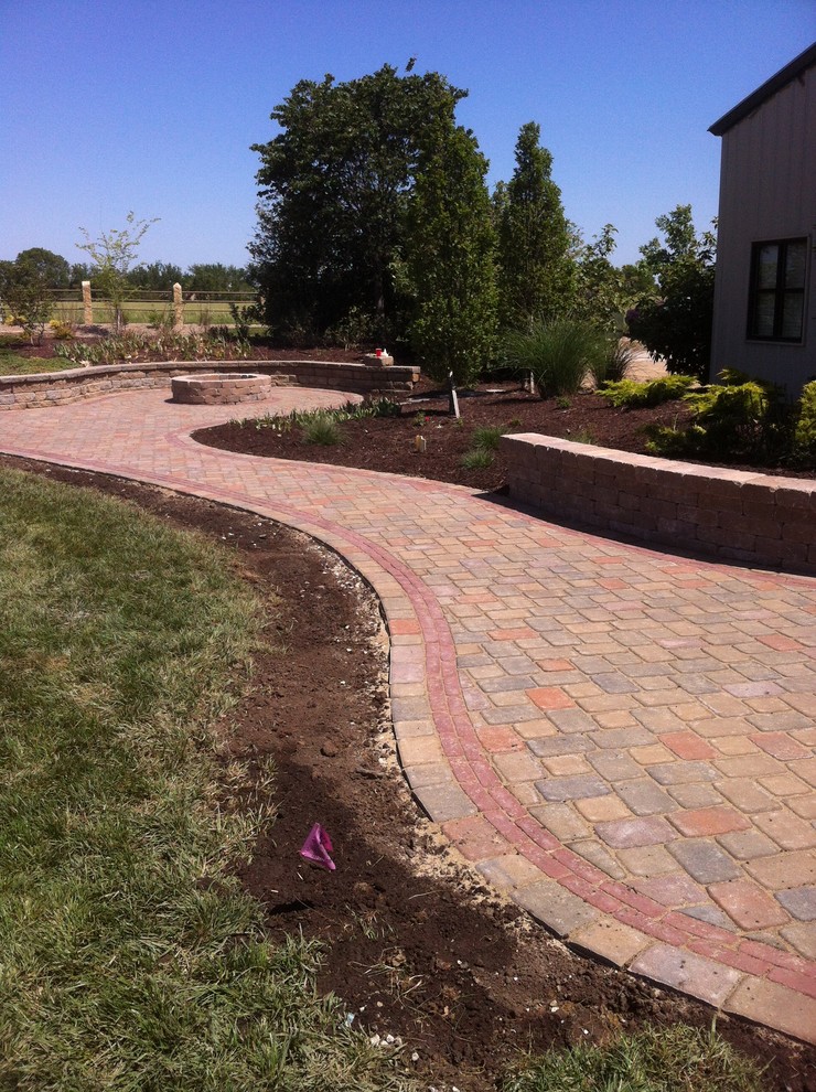 Cambridge Cobble Patio Traditional Patio Other by Topeka