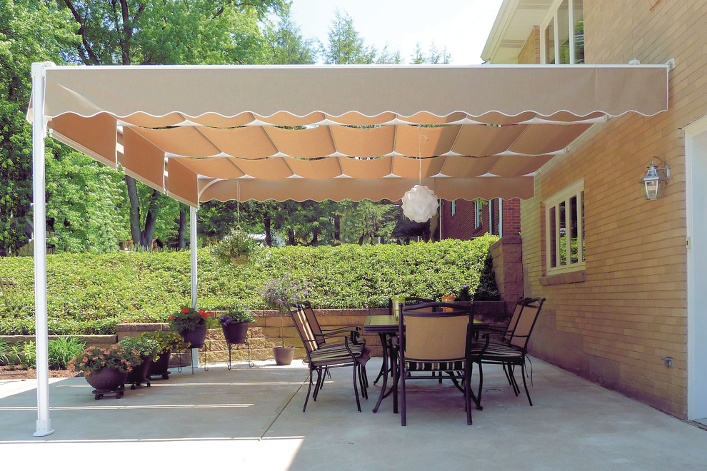 capri-white-aluminum-structure-with-canopies-attached-to-house