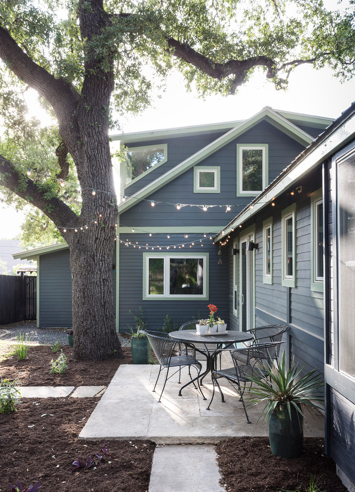 Patio - mid-sized contemporary backyard stone patio idea in Austin with no cover