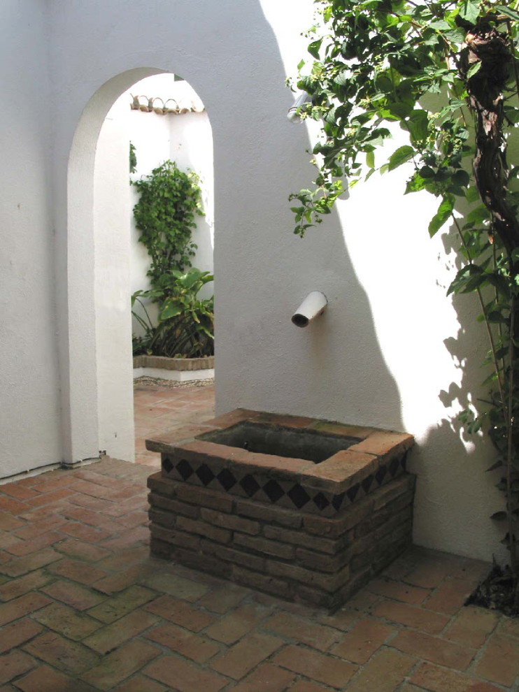 Immagine di un patio o portico stile rurale