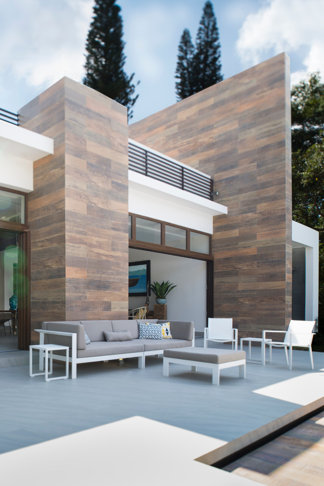 Unbedeckter Moderner Patio mit Betonplatten in Sonstige