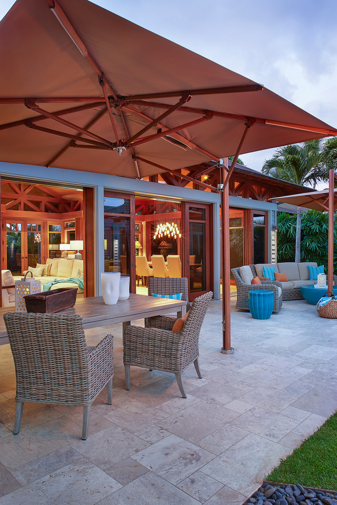 Nautical back patio in Hawaii with an awning.