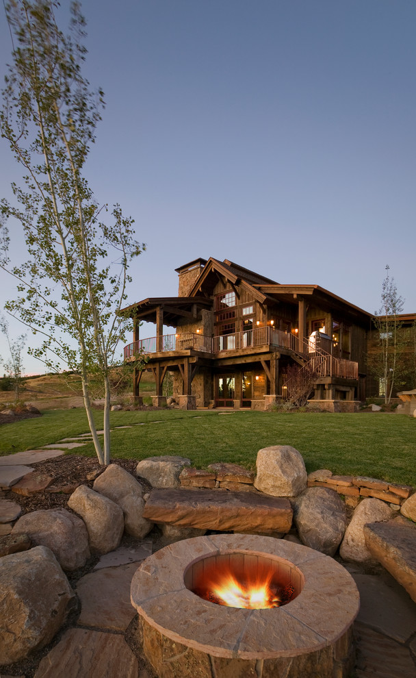 Inspiration for a timeless patio remodel in Denver with a fire pit